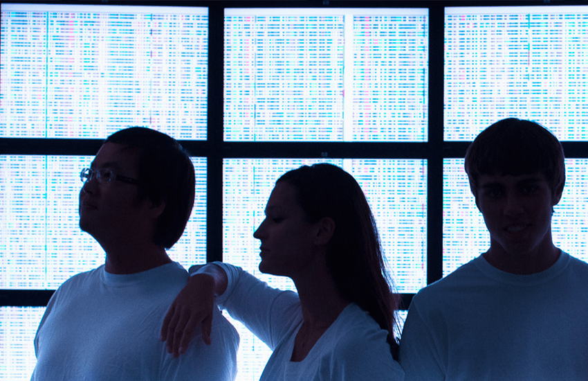 Silhouettes in front of genomic data